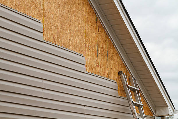 Professional Emergency Siding Repair technician working in Winterville, NC